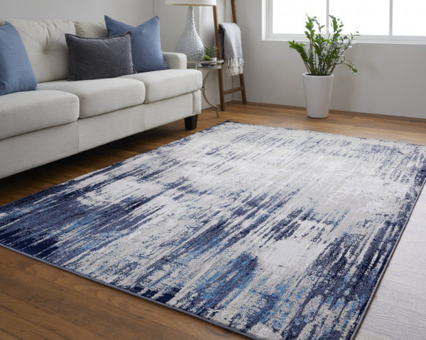 HomeRoots 4' Abstract Tan Blue Ivory Distressed Area Rug - Modern Power Loomed Design for Stylish Interiors 10' X 13' 513907