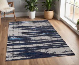 HomeRoots 4' Stylish Ivory and Blue Abstract Area Rug – Durable Power-Loomed Design for Modern Living Spaces 4' X 6' 513910