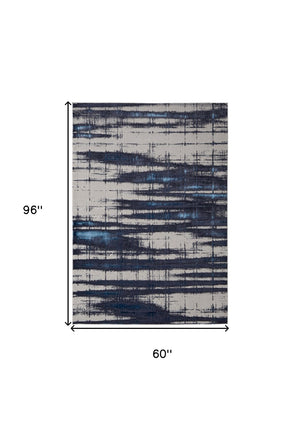 HomeRoots 4' Stylish Ivory and Blue Abstract Area Rug – Durable Power-Loomed Design for Modern Living Spaces 5' X 8' 513911