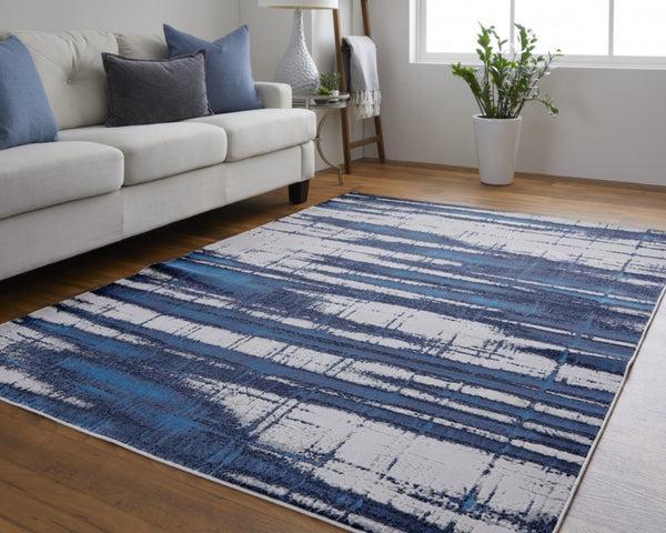 HomeRoots 4' Stylish Ivory and Blue Abstract Area Rug – Durable Power-Loomed Design for Modern Living Spaces 9' X 12' 513914
