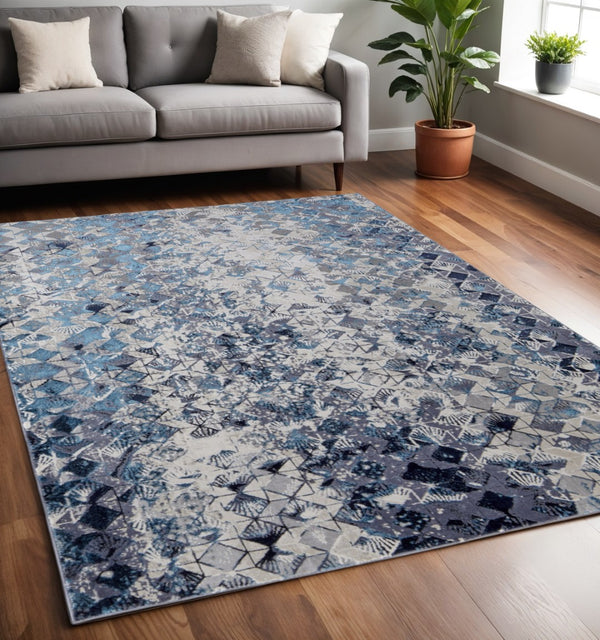 HomeRoots 4' Refreshing Blue, Ivory & Gray Geometric Distressed Area Rug for Modern Home Décor & Comfort 5' X 8' 513919