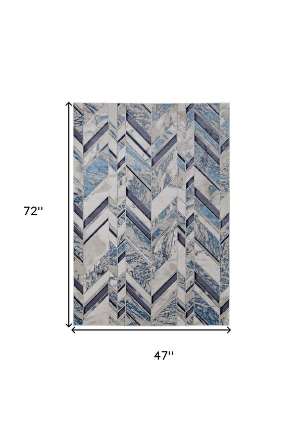Homeroots 4' X 6' Ivory And Blue Chevron Power Loom Distressed Area Rug  Polypropylene,Polyester 513926