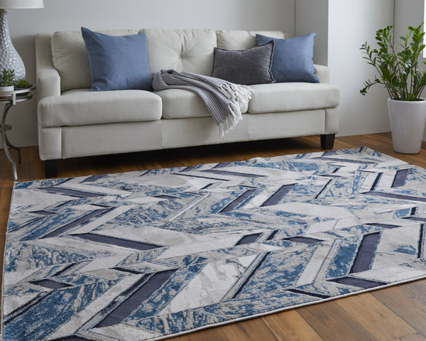 Homeroots 8' X 10' Ivory Blue And Gray Chevron Power Loom Distressed Area Rug  Polyester 513928