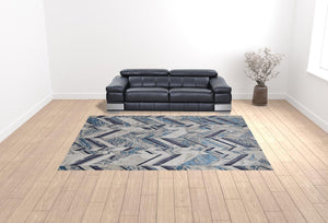Homeroots 10' X 13' Ivory Blue And Gray Chevron Power Loom Distressed Area Rug  Polyester 513931