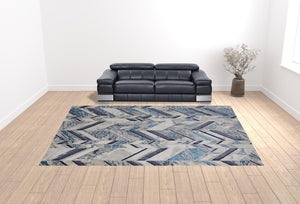 Homeroots 12' X 15' Ivory Blue And Gray Chevron Power Loom Distressed Area Rug  Polyester 513933