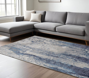 Homeroots 8' X 10' Ivory And Blue Abstract Power Loom Distressed Non Skid Area Rug  Polyester 513936