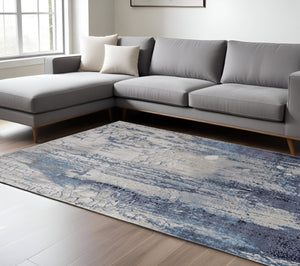 HomeRoots 4' Ivory and Blue Abstract Area Rug - Power Loomed Distressed Design for Stylish Home Decor 7' X 10' 513937