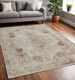 Homeroots 5' X 8' Tan And Ivory Floral Power Loom Distressed Non Skid Area Rug With Fringe  Polypropylene 513950