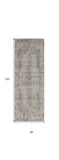 Homeroots 10' Tan And Ivory Floral Power Loom Distressed Non Skid Runner Rug  Polypropylene 513953