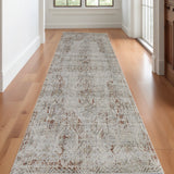 Homeroots 10' Tan And Ivory Floral Power Loom Distressed Non Skid Runner Rug  Polypropylene 513953