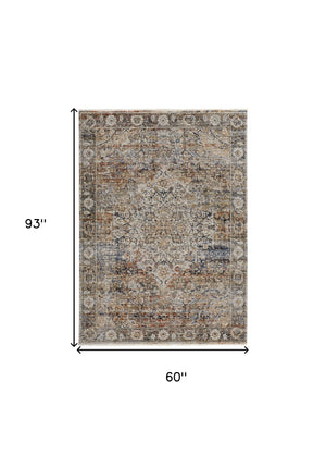 Homeroots 5' X 8' Tan And Blue Floral Power Loom Distressed Non Skid Area Rug With Fringe  Polypropylene 513966