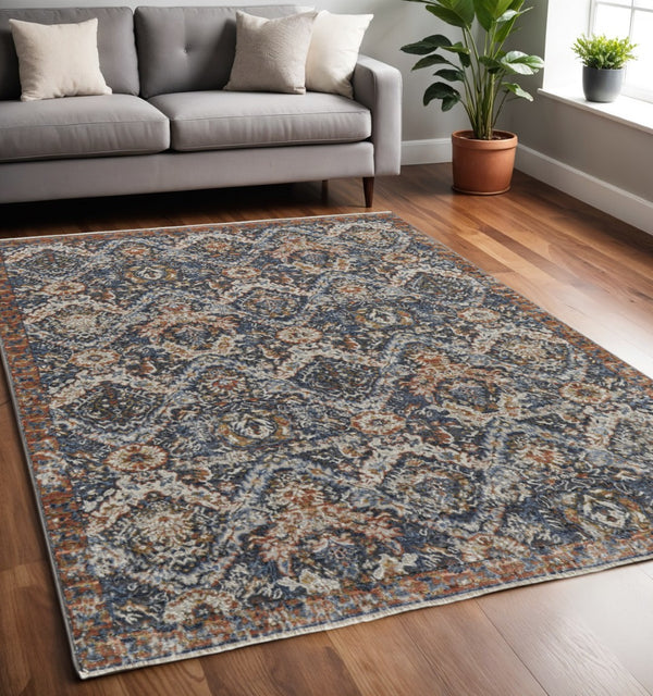 HomeRoots 5' Elegant Floral Area Rug in Ivory, Blue, and Burnt Orange with Fringed Edges for Timeless Style 5' X 8' 513990