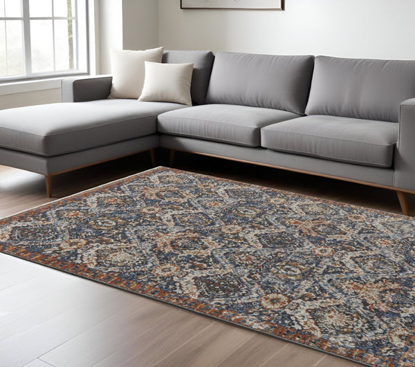 HomeRoots 5' Elegant Floral Area Rug in Ivory, Blue, and Burnt Orange with Fringed Edges for Timeless Style 8' X 10' 513991