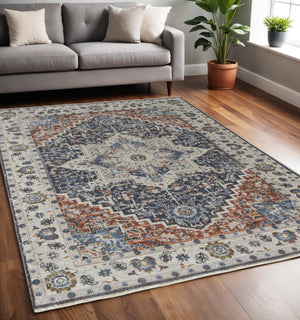 Homeroots 5' X 8' Ivory And Blue Floral Power Loom Non Skid Area Rug With Fringe  Polypropylene 513998