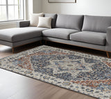 Homeroots 8' X 10' Ivory And Blue Floral Power Loom Non Skid Area Rug With Fringe  Polypropylene 513999