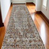 Homeroots 12' Tan Ivory And Orange Floral Power Loom Non Skid Runner Rug  Polypropylene 514019