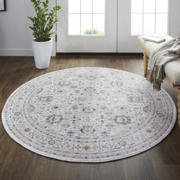 Homeroots 6' Tan Ivory And Blue Round Floral Stain Resistant Area Rug  Polypropylene 514086