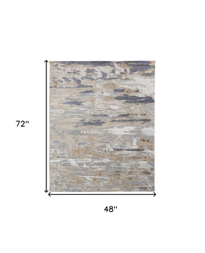 HomeRoots 4' Enhance Your Space with a Tan Ivory and Blue Abstract Distressed Area Rug for Modern Decor 4' X 6' 514131