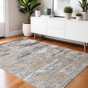 HomeRoots 4' Enhance Your Space with a Tan Ivory and Blue Abstract Distressed Area Rug for Modern Decor 4' X 6' 514131