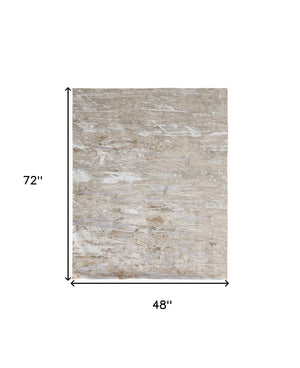 HomeRoots 4' Enhance Your Space with a Tan Ivory and Blue Abstract Distressed Area Rug for Modern Decor 4' X 6' 514140