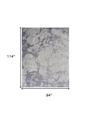 HomeRoots 4' Elegant Ivory and Blue Abstract Area Rug - Power Loomed, Distressed Design for Modern Spaces 8' X 10' 514169