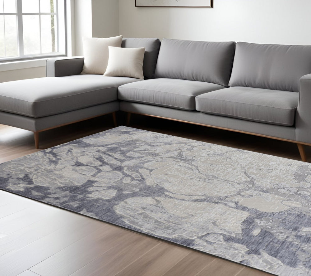 HomeRoots 4' Elegant Ivory and Blue Abstract Area Rug - Power Loomed, Distressed Design for Modern Spaces 8' X 10' 514169