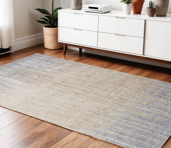 HomeRoots 4' Tan and Blue Abstract Distressed Area Rug – Modern, Durable Design for Stylish Home Décor 4' X 6' 514185