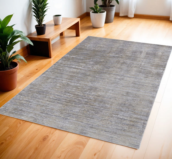 HomeRoots 4' Modern Abstract Area Rug in Taupe, Silver, and Tan - Durable Power Loomed Design for Any Space 4' X 6' 514194