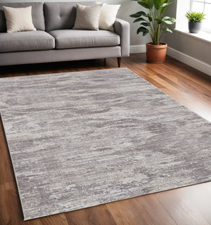 Homeroots 5' X 8' Tan And Gray Abstract Power Loom Distressed Area Rug Tan,Taupe,Gray Polyester 514206