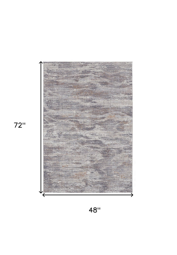 Homeroots 4' X 6' Taupe Tan And Orange Abstract Power Loom Distressed Stain Resistant Area Rug Taupe,Tan,Orange Polyester 514214