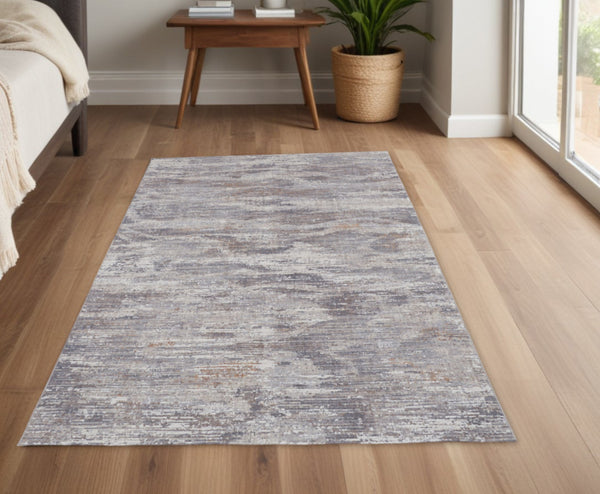 Homeroots 4' X 6' Taupe Tan And Orange Abstract Power Loom Distressed Stain Resistant Area Rug Taupe,Tan,Orange Polyester 514214