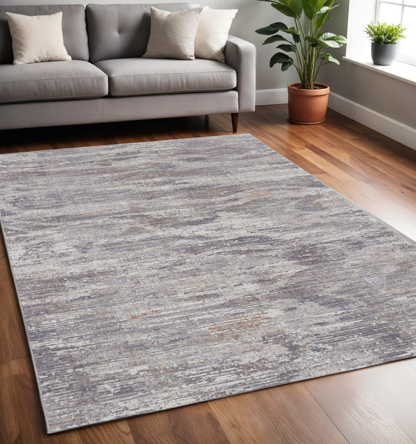 Homeroots 5' X 8' Taupe Tan And Orange Abstract Power Loom Distressed Area Rug Taupe,Tan,Orange Polyester 514215