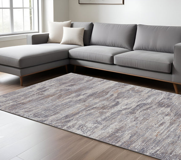 Homeroots 7' X 9' Taupe Tan And Orange Abstract Power Loom Distressed Area Rug Taupe,Tan,Orange Polyester 514217