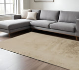 Homeroots 7' X 10' Tan Shag Non Skid Area Rug Tan Polyester 514252