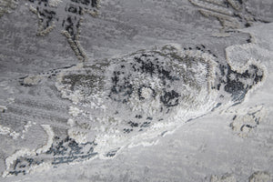 Homeroots 7' X 10' Black And Silver Floral Power Loom Distressed Non Skid Area Rug  Polyester 514283