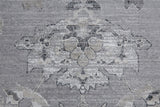 Homeroots 7' X 10' Black And Silver Floral Power Loom Distressed Non Skid Area Rug  Polyester 514283