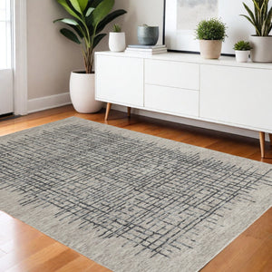 HomeRoots 4' Handmade Tufted Wool Area Rug in Tan and Brown Plaid – Stain-Resistant for Homes with Kids & Pets 4' X 6' 514337