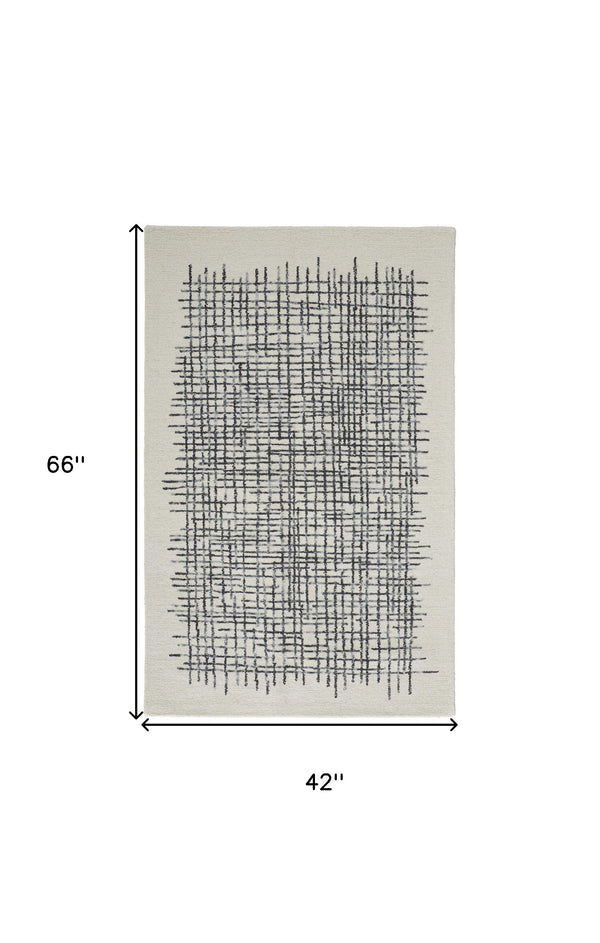 Homeroots 4' X 6' Ivory Gray And Black Wool Plaid Tufted Handmade Stain Resistant Area Rug Ivory,Gray,Black Wool 514344