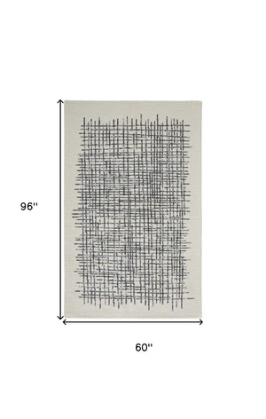 Homeroots 5' X 8' Ivory Gray And Black Wool Plaid Tufted Handmade Stain Resistant Area Rug Ivory,Gray,Black Wool 514345