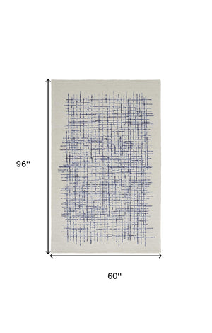 Homeroots 4' Invigorating Tan And Brown Wool Plaid Handmade Area Rug - Stain Resistant For Stylish Living Spaces 5' X 8' Wool 514352