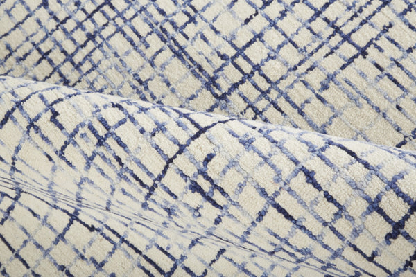 Homeroots 4' Invigorating Tan And Brown Wool Plaid Handmade Area Rug - Stain Resistant For Stylish Living Spaces 8' X 10' Wool 514353