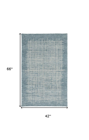 HomeRoots 4' Handmade Tufted Wool Area Rug in Tan and Brown Plaid – Stain-Resistant for Homes with Kids & Pets 4' X 6' 514365