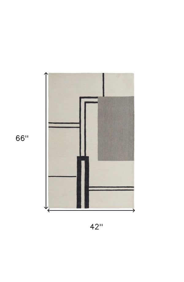 HomeRoots 4' Soft Gray and Ivory Wool Area Rug with Abstract Geometric Design for Modern Living Spaces 4' X 6' 514372