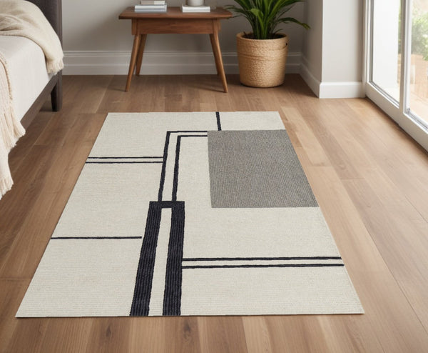 HomeRoots 4' Soft Gray and Ivory Wool Area Rug with Abstract Geometric Design for Modern Living Spaces 4' X 6' 514372