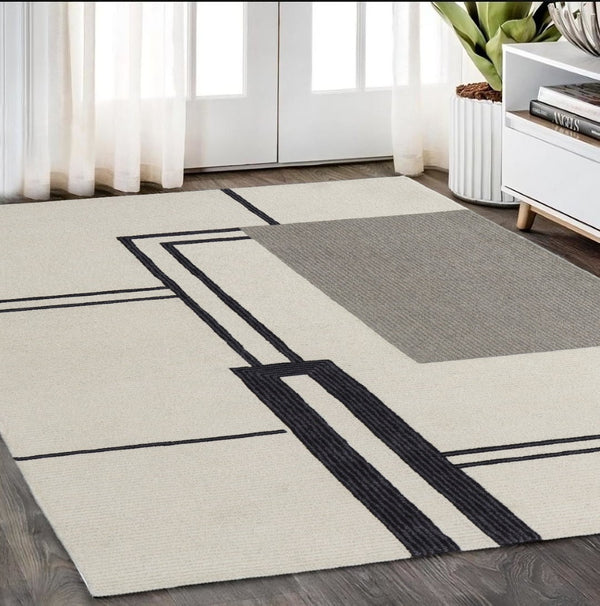 HomeRoots 4' Soft Gray and Ivory Wool Area Rug with Abstract Geometric Design for Modern Living Spaces 5' X 8' 514373