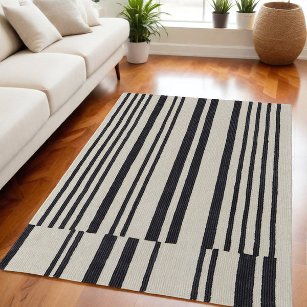 HomeRoots 4' Luxurious Ivory and Black Hand-Tufted Wool Abstract Area Rug for Modern Home Décor Elegance 5' X 8' 514387