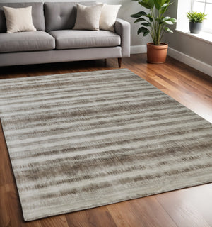 Homeroots 5' X 8' Tan And Ivory Abstract Hand Woven Area Rug Tan,Ivory,Brown Viscose 514436