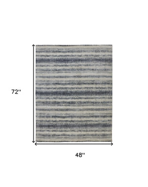 Homeroots 4' X 6' Ivory And Blue Abstract Hand Woven Area Rug Ivory,Blue Viscose 514449