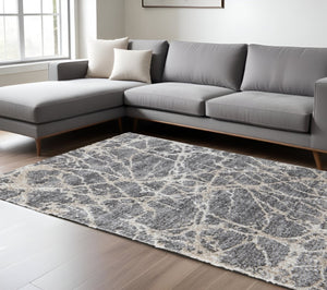HomeRoots 4' Modern Gray and Ivory Abstract Area Rug – Stain Resistant, Durable, Perfect for High-Traffic Spaces 9' X 12' 514522