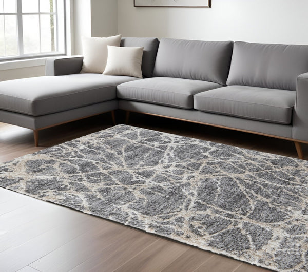 HomeRoots 4' Modern Gray and Ivory Abstract Area Rug – Stain Resistant, Durable, Perfect for High-Traffic Spaces 9' X 12' 514522